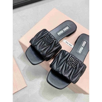 Miu Miu Slides in Black Matelasse Nappa Leather